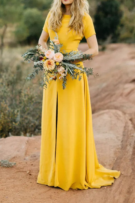 Wedding Dress  Tagged "Boat, Yellow, Keyhole Back, Short Sleeves"  JoJo  Bridal Shop